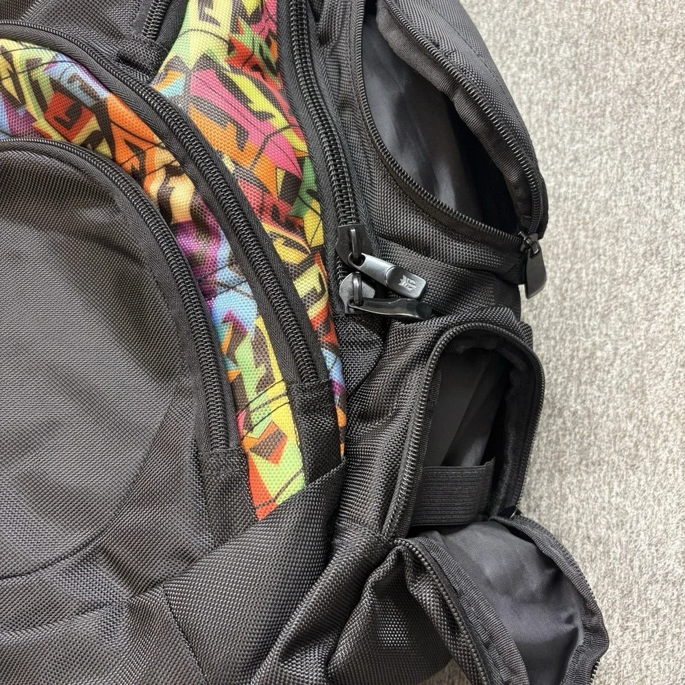 REIGN Total Body Fuel Backpack Black w/ Colorful Graffiti Accents‎ Multi Pocket